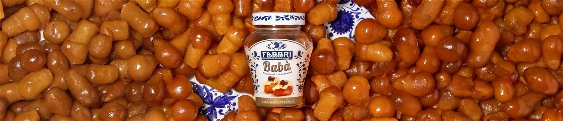 Piccoli, irresistibili e avvolti da una delicata bagna al rum: scopri i Babà di Fabbri 1905!